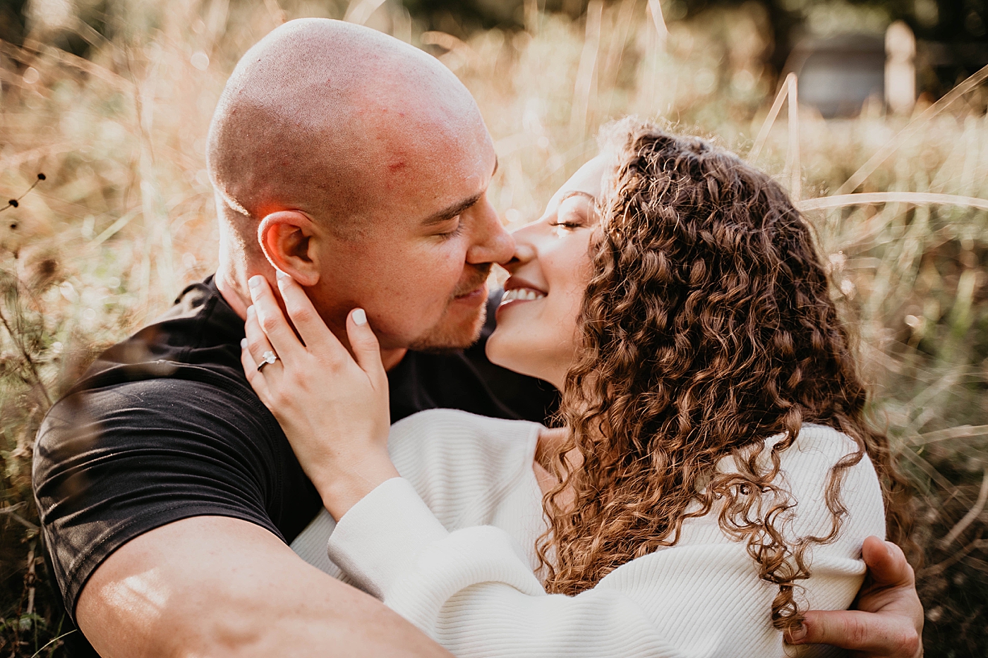 Closeup of couple holding each other about to kiss each other Romantic Riverbend Park Engagement Photography captured by South Florida Photographer Krystal Capone Photography