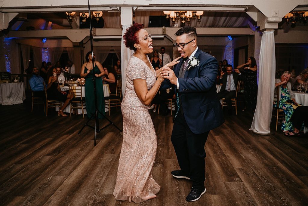 Fun Mother son dance at Reception 94th Aero Squadron Miami Wedding Photography captured by South Florida Engagement Photographer Krystal Capone Photography 