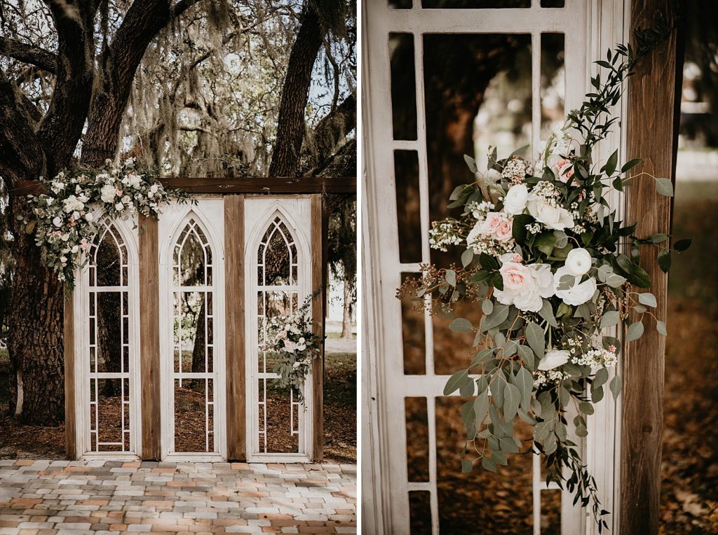 Detail shot of Ceremny archway with white floral decorations Ever After Farms Wedding Photography captured by South Florida Wedding Photographer Krystal Capone Photography 