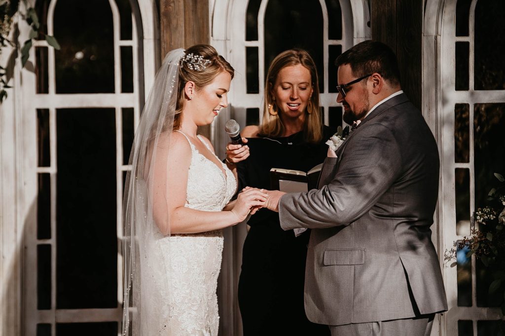 Bride giving vows to Groom Ceremony Ever After Farms Wedding Photography captured by South Florida Wedding Photographer Krystal Capone Photography 