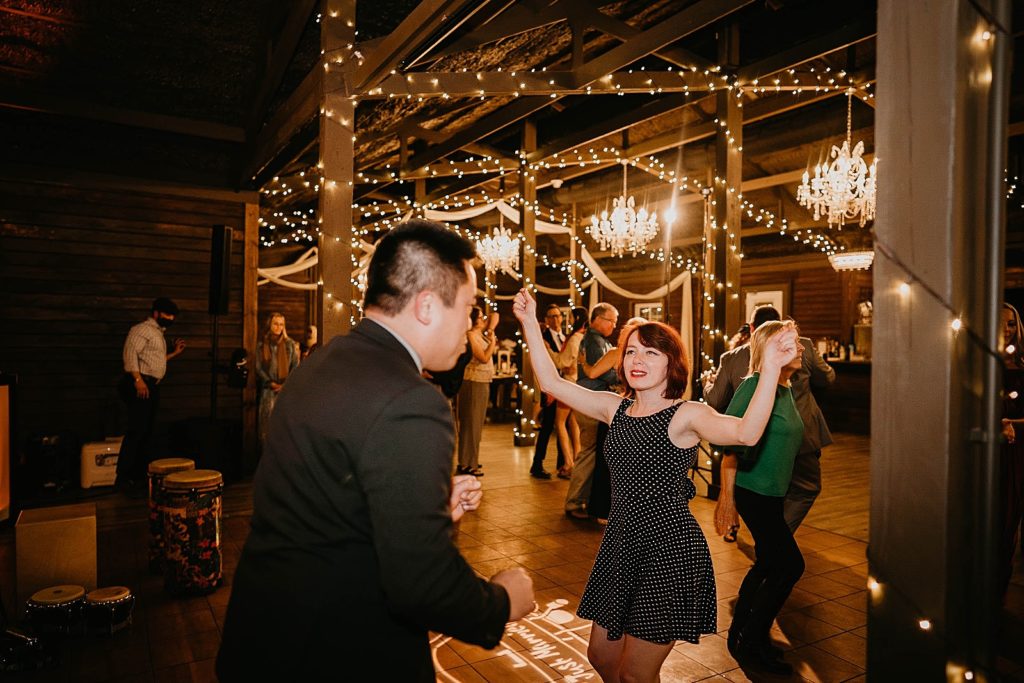 Fun dancing at reception Ever After Farms Wedding Photography captured by South Florida Wedding Photographer Krystal Capone Photography 
