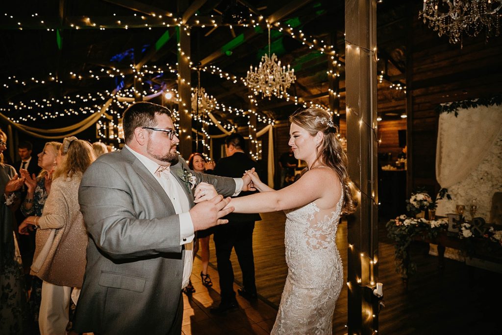 Bride and Groom dancing at reception Ever After Farms Wedding Photography captured by South Florida Wedding Photographer Krystal Capone Photography 