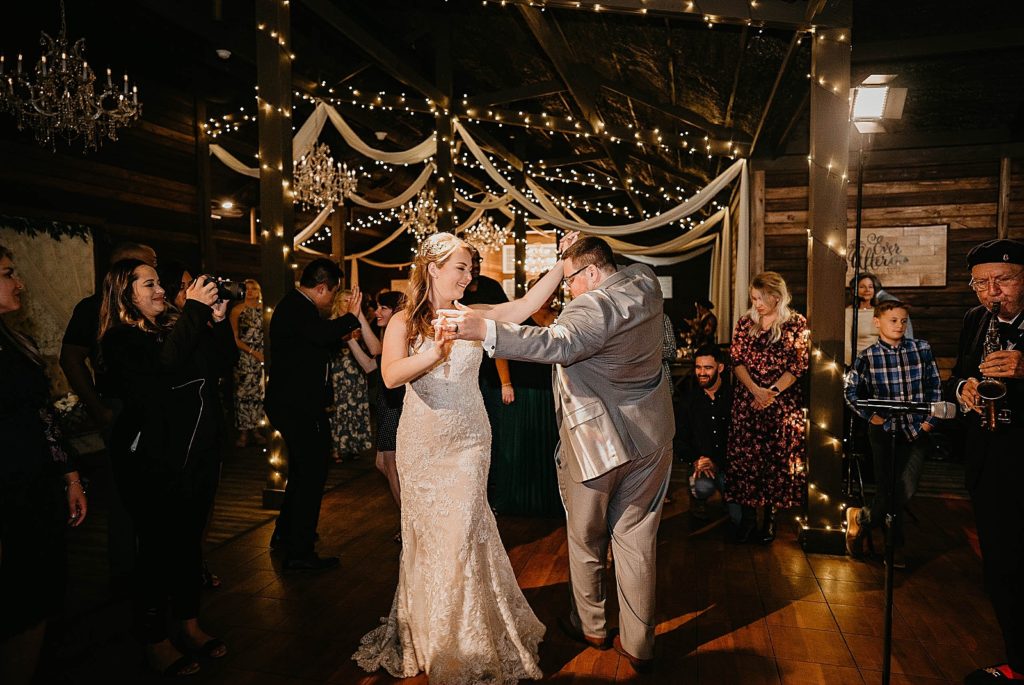 Bride Groom having fun dancing at the reception dance floor Ever After Farms Wedding Photography captured by South Florida Wedding Photographer Krystal Capone Photography 