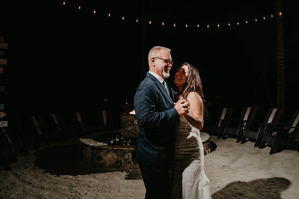 Father Daughter dance during the night Hawks Cay Resort Wedding Photography captured by South Florida Wedding Photographer Krystal Capone Photography