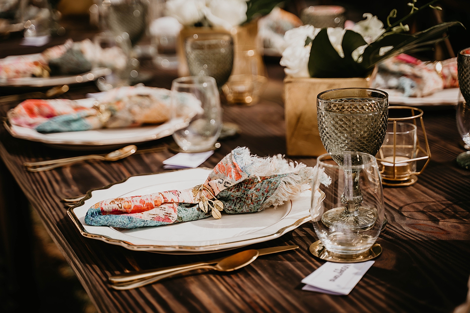 Reception detail shot of table with dishware and colorful napkin Intimate South Florida Wedding Photography captured by South Florida Wedding Photographer Krystal Capone Photography 