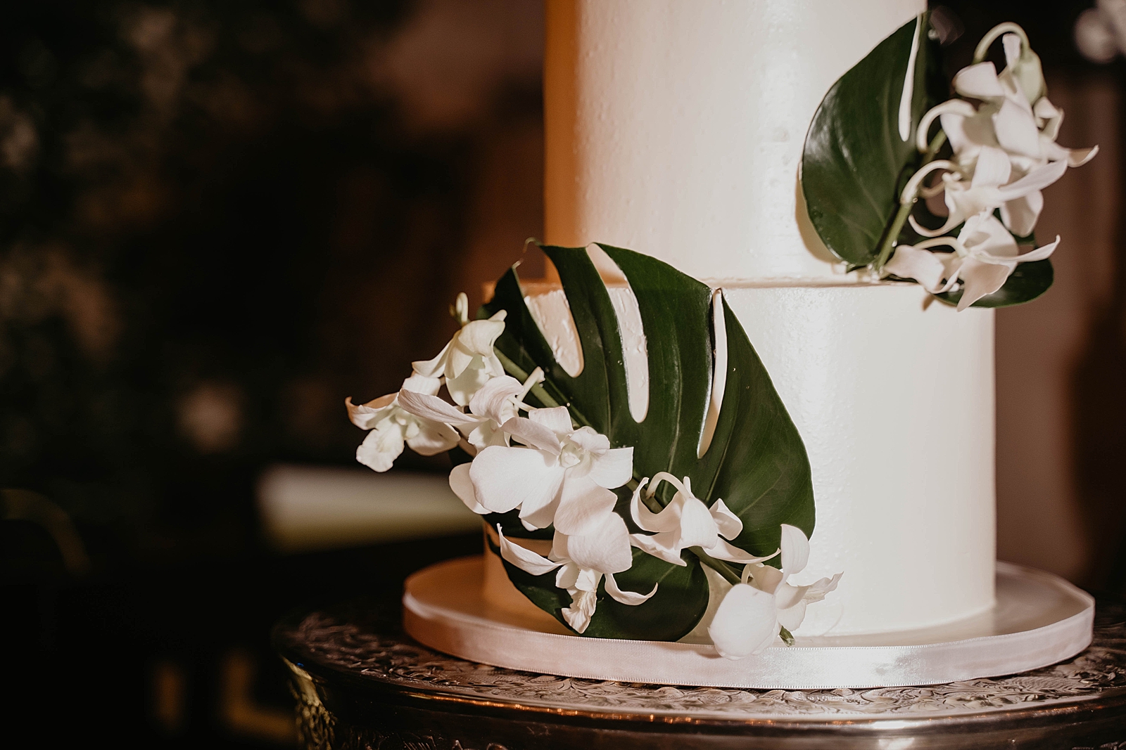 Detail shot of banana leaf wedding cake Intimate South Florida Wedding Photography captured by South Florida Wedding Photographer Krystal Capone Photography 