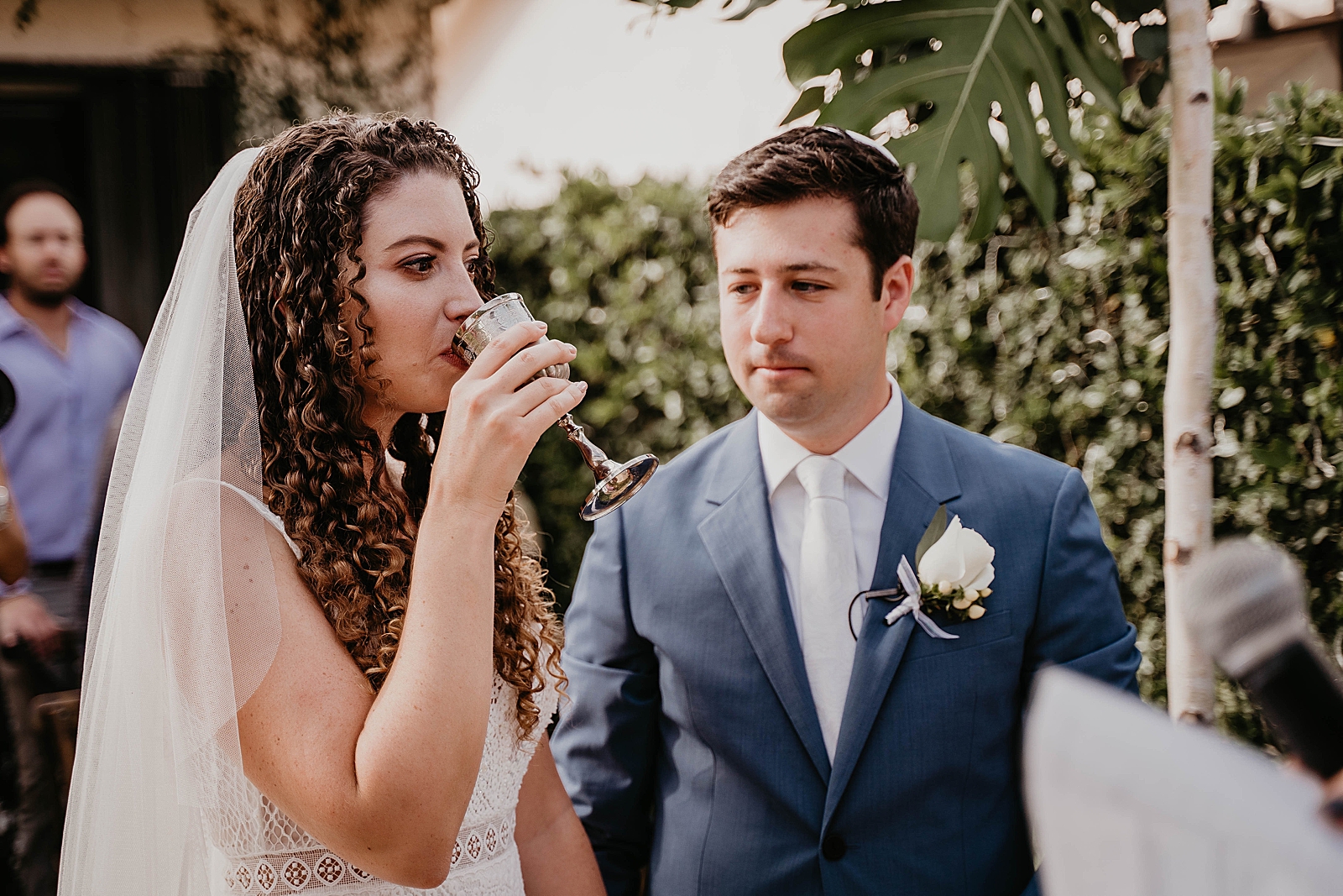 Bride drinking for Kiddushin Intimate South Florida Wedding Photography captured by South Florida Wedding Photographer Krystal Capone Photography 