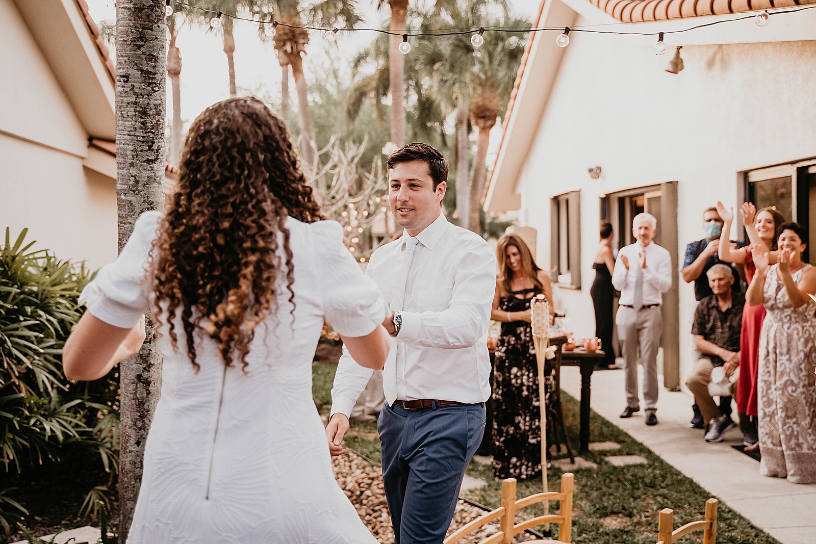 Bride and Groom first dance by Hora chairs Intimate South Florida Wedding Photography captured by South Florida Wedding Photographer Krystal Capone Photography 