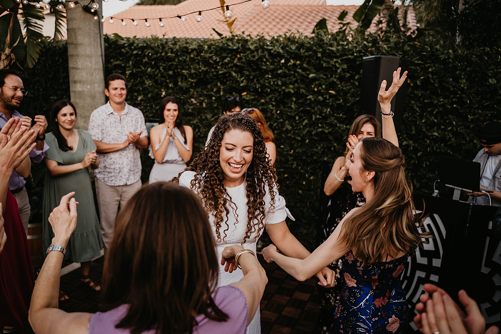 Bride dancing with friends and family Intimate South Florida Wedding Photography captured by South Florida Wedding Photographer Krystal Capone Photography 