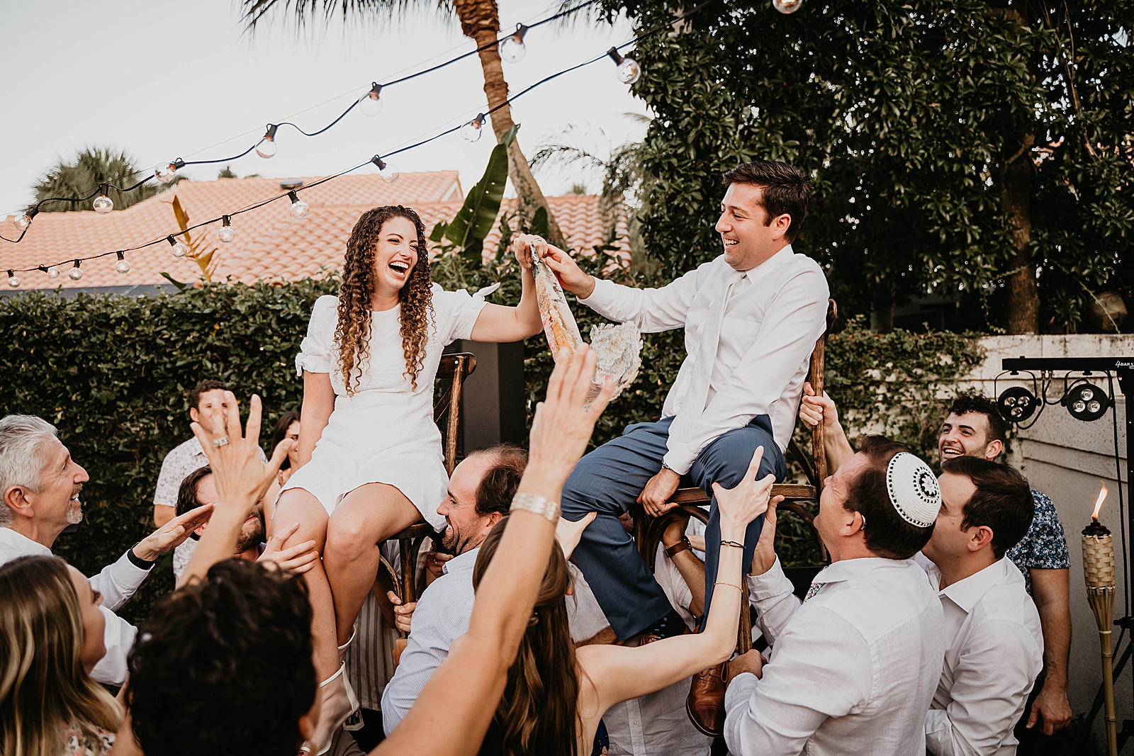 Bride and Groom laughing during Hora Intimate South Florida Wedding Photography captured by South Florida Wedding Photographer Krystal Capone Photography 