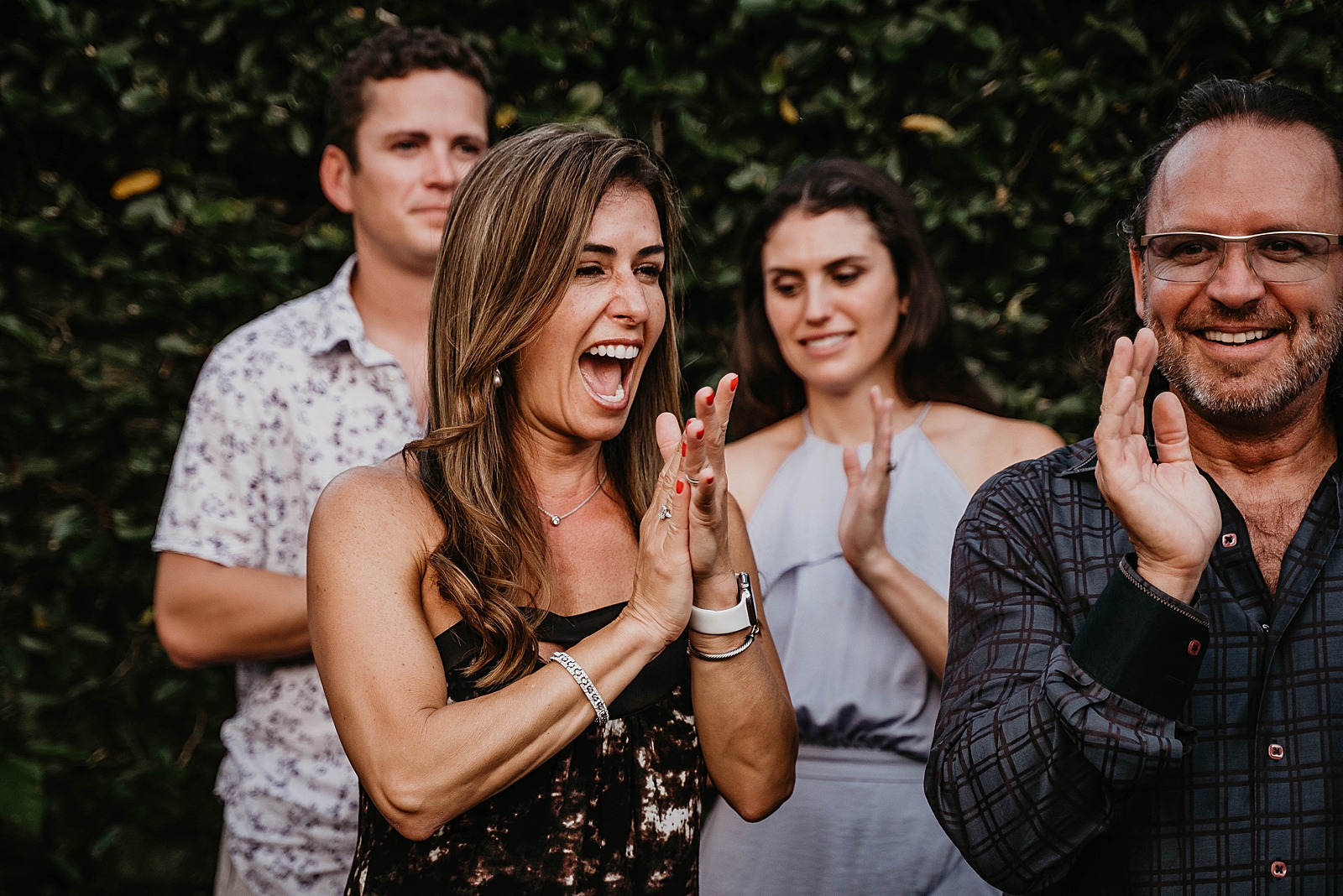 Friends and Family clapping during ceremony Intimate South Florida Wedding Photography captured by South Florida Wedding Photographer Krystal Capone Photography 