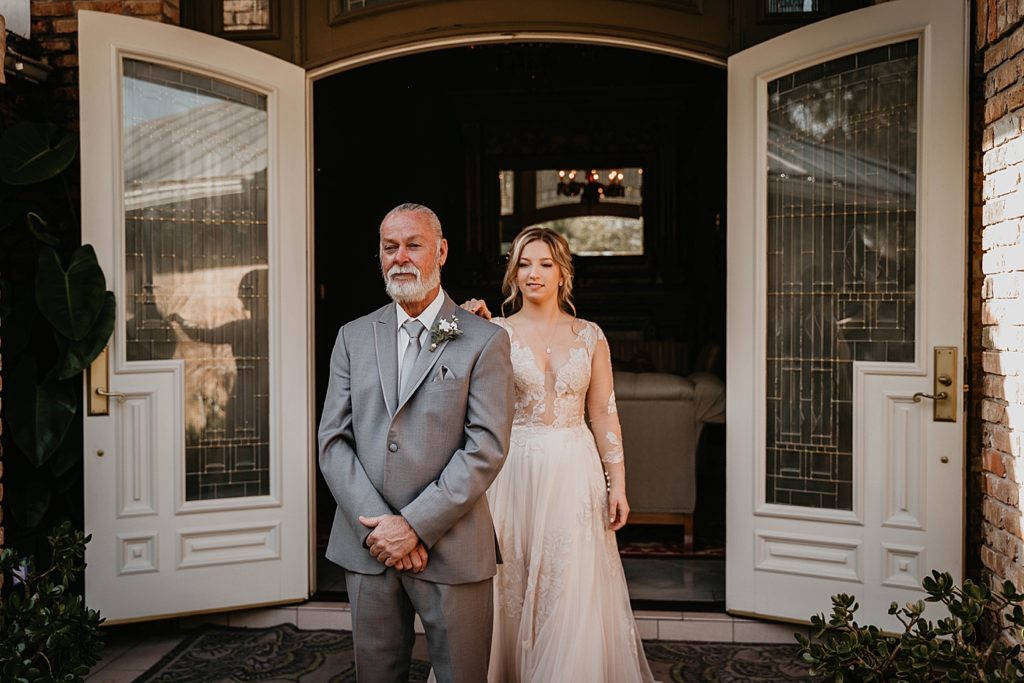 Father Daughter First Look Bride tapping Father on shoulder Intimate South Florida Wedding Photography captured by South Florida Wedding Photographer Krystal Capone Photography 