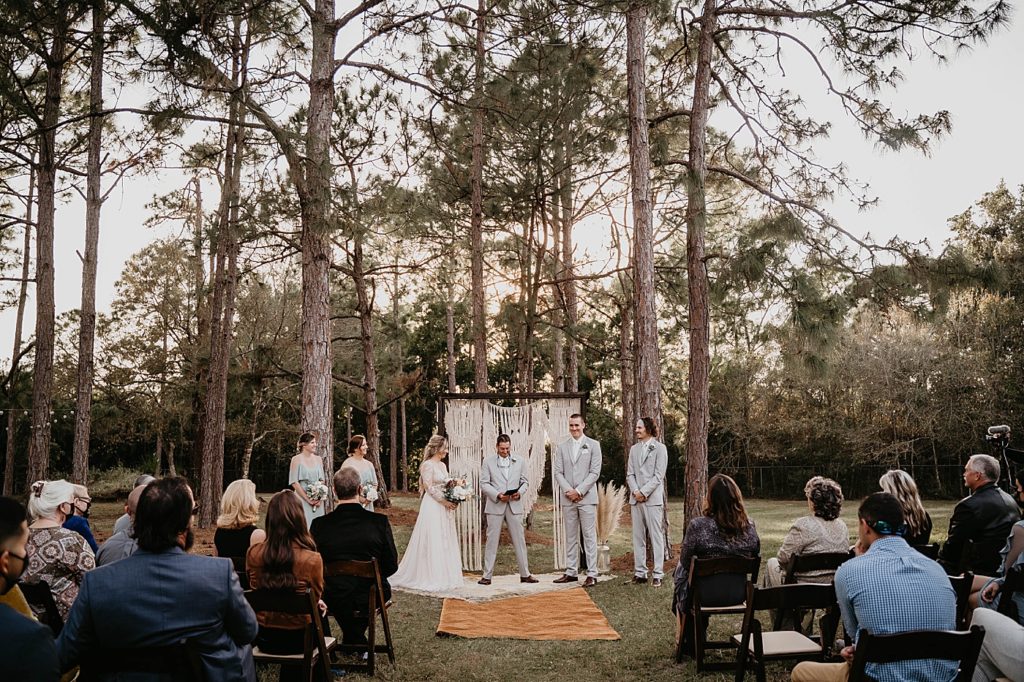 Wide shot of outdoor Ceremony Intimate South Florida Wedding Photography captured by South Florida Wedding Photographer Krystal Capone Photography 