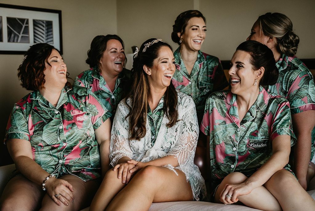 Bride with Bridesmaids about to get ready Jupiter Beach Resort Wedding Photography captured by South Florida Wedding Photographer Krystal Capone Photography 