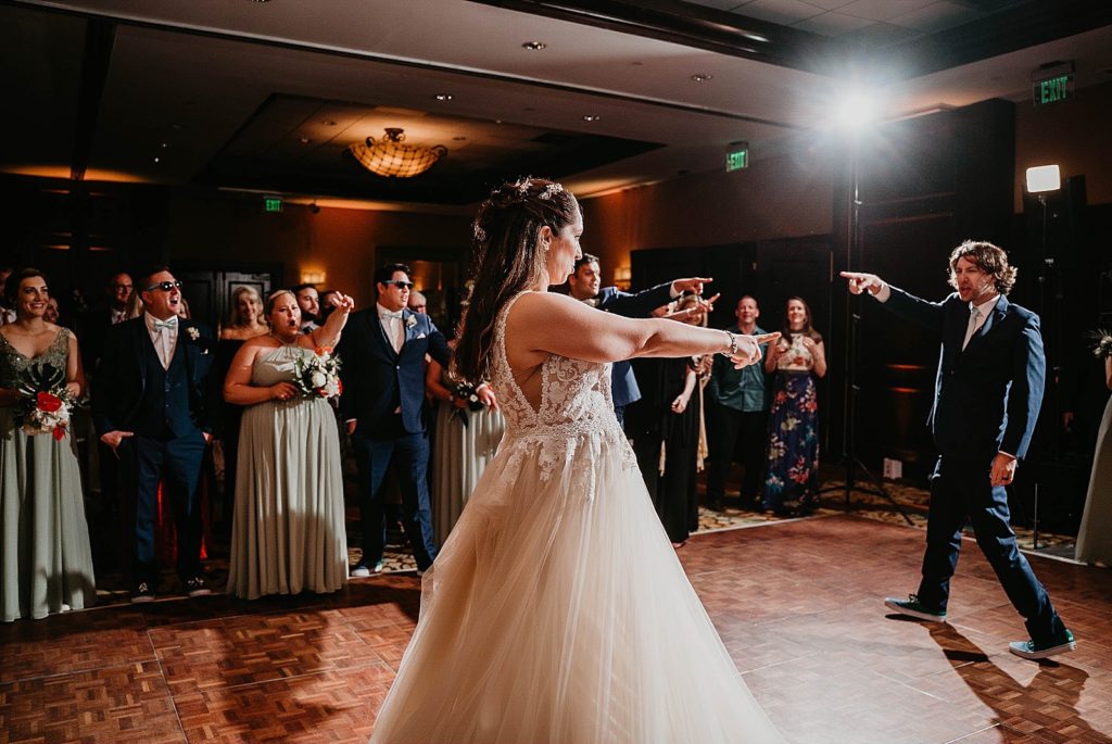 Bride and Groom doing an extravagant First dance Jupiter Beach Resort Wedding Photography captured by South Florida Wedding Photographer Krystal Capone Photography  