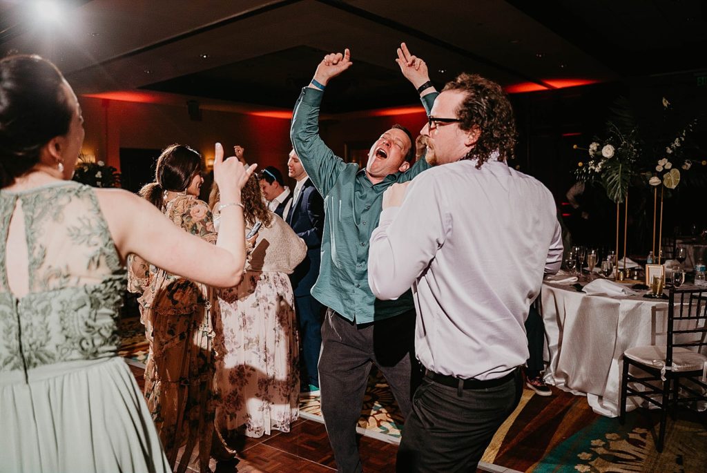 Dancing at the reception Jupiter Beach Resort Wedding Photography captured by South Florida Wedding Photographer Krystal Capone Photography 
