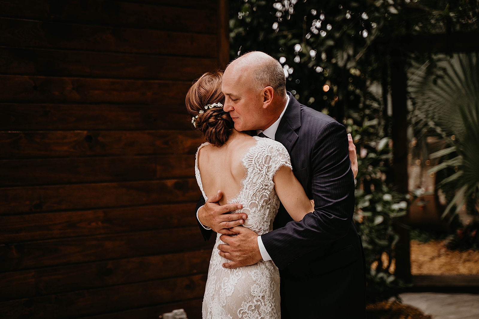 Bride and father hugging after First Look Living Sculptures Sanctuary Wedding Photography captured by South Florida Wedding Photographer Krystal Capone Photography 