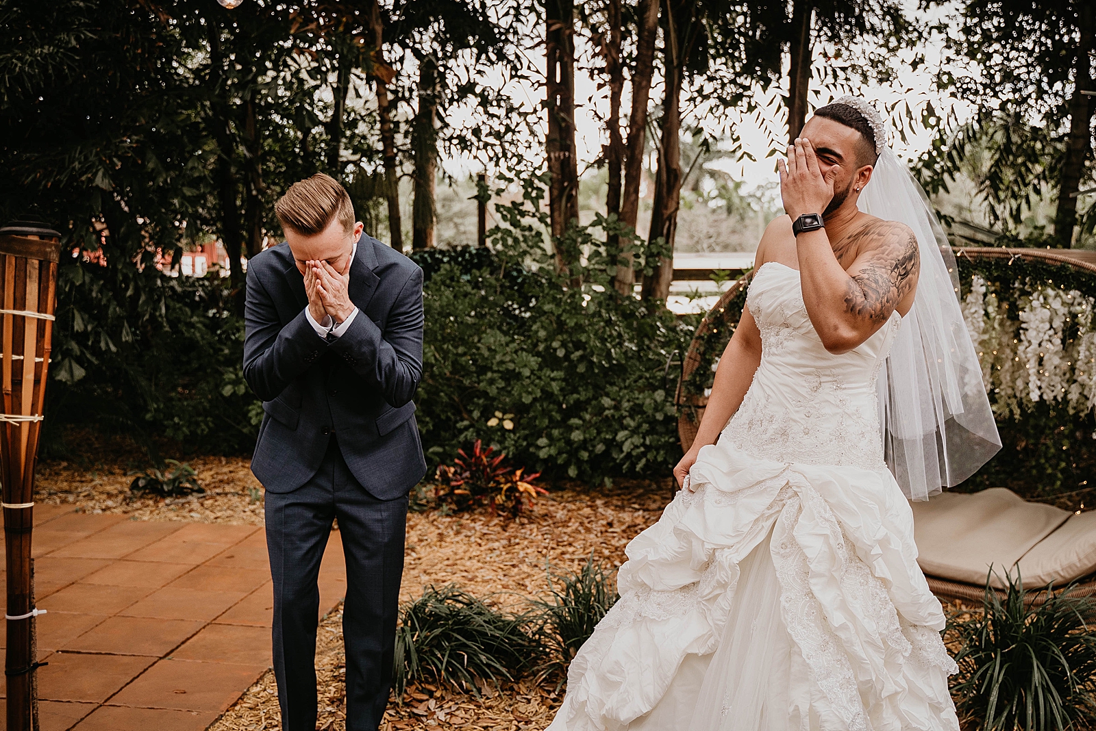 Groom laughing with pretend bro Bride in dress you got pranked Living Sculptures Sanctuary Wedding Photography captured by South Florida Wedding Photographer Krystal Capone Photography 