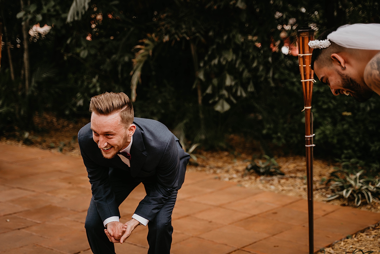Groom's reaction to false Bride First Look Living Sculptures Sanctuary Wedding Photography captured by South Florida Wedding Photographer Krystal Capone Photography 