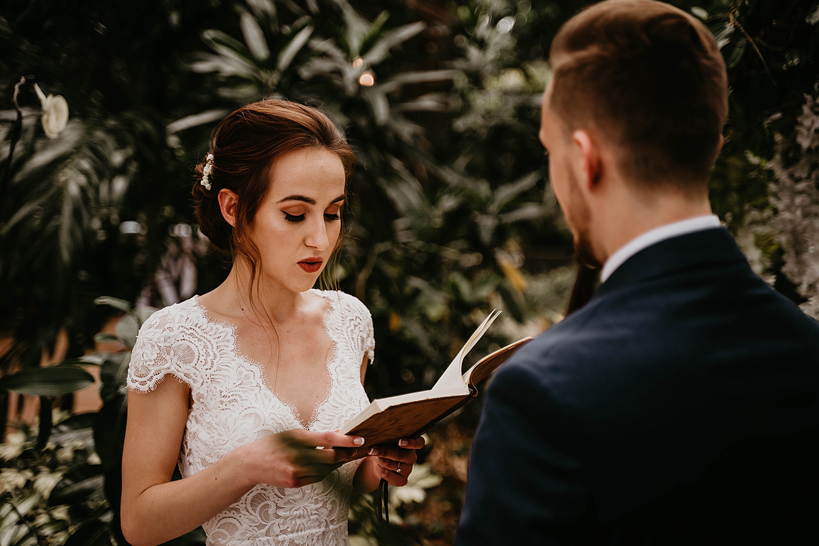 Bride reading vows to Groom after First Look Living Sculptures Sanctuary Wedding Photography captured by South Florida Wedding Photographer Krystal Capone Photography 