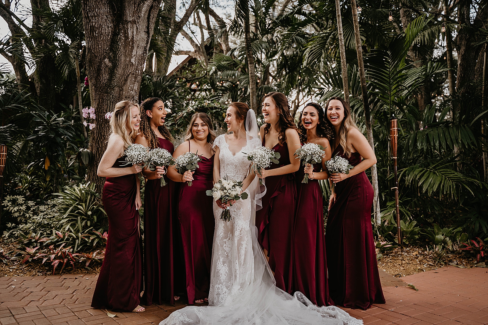 Bride with happy laughing Bridesmaids Living Sculptures Sanctuary Wedding Photography captured by South Florida Wedding Photographer Krystal Capone Photography 