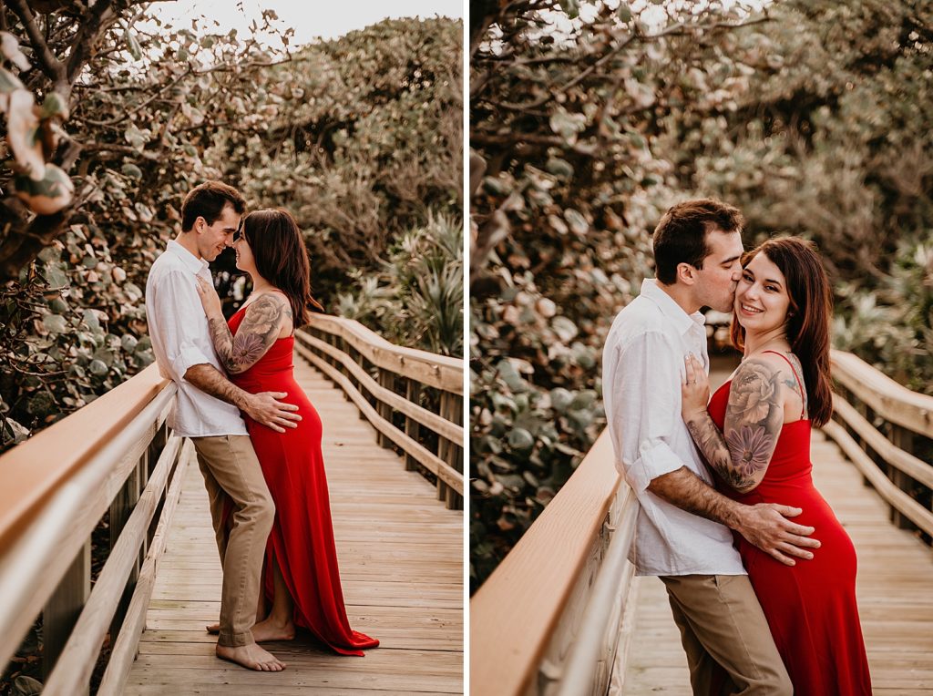 Couple holding each other on a wooden bridge with man kissing lady on the cheek Palm Beach Engagement Photography captured by South Florida Engagement Photographer Krystal Capone Photography 