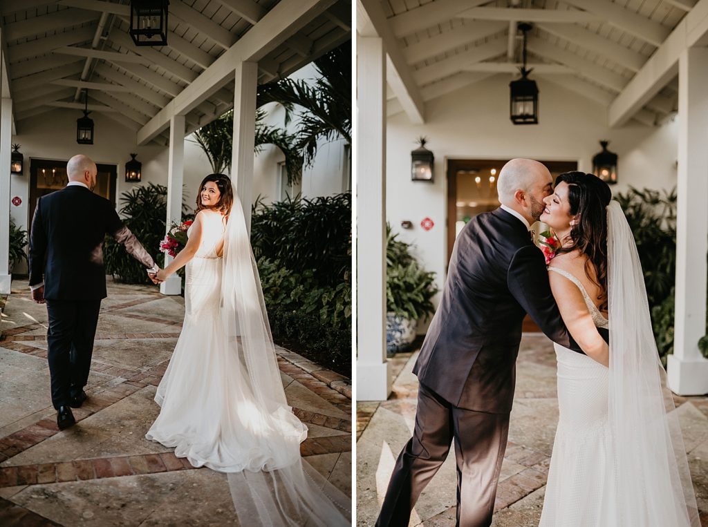 Bride and Groom holding hands and walking together with Bride looking behind her back Pelican Club Wedding Photography captured by South Florida Wedding Photographer Krystal Capone Photography 