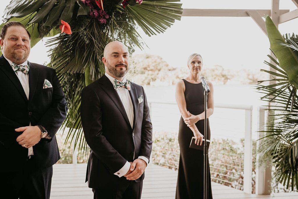 Groom awaiting Bride for Ceremony Pelican Club Wedding Photography captured by South Florida Wedding Photographer Krystal Capone Photography 