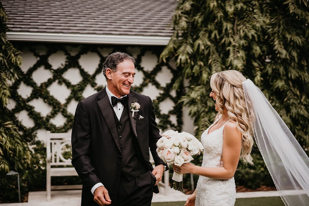 Father's reaction to first look at Bride in wedding dress Pelican Club Wedding Photography captured by South Florida Wedding Photographer Krystal Capone Photography