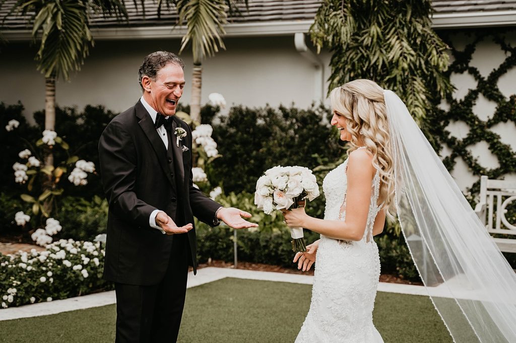 Father excited to see daughter in wedding dress Pelican Club Wedding Photography captured by South Florida Wedding Photographer Krystal Capone Photography