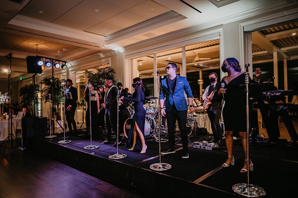Live band performing at Wedding Reception Pelican Club Wedding Photography captured by South Florida Wedding Photographer Krystal Capone Photography