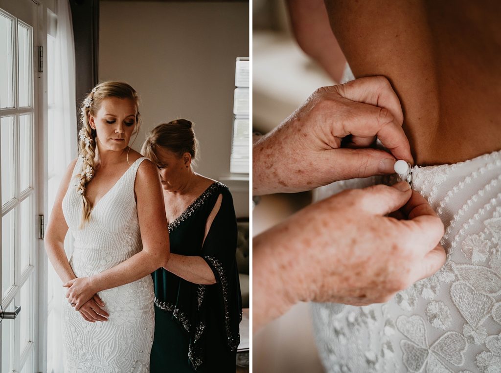 Mother helping Bride get ready by buttoning wedding dress The Lake House Fort Pierce Wedding Photography captured by South Florida Wedding Photographer Krystal Capone Photography 