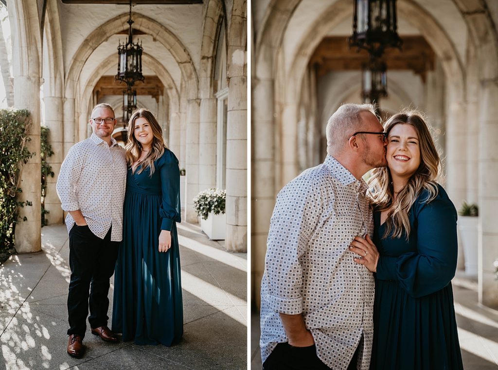 Couple standing together under breezeway with man kissing woman on the cheek Worth Ave Palm Beach Engagement Photography captured by South Florida Engagement Photographer Krystal Capone Photography