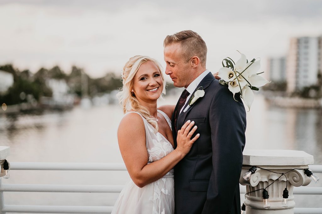 Bride and Groom portrait by the water