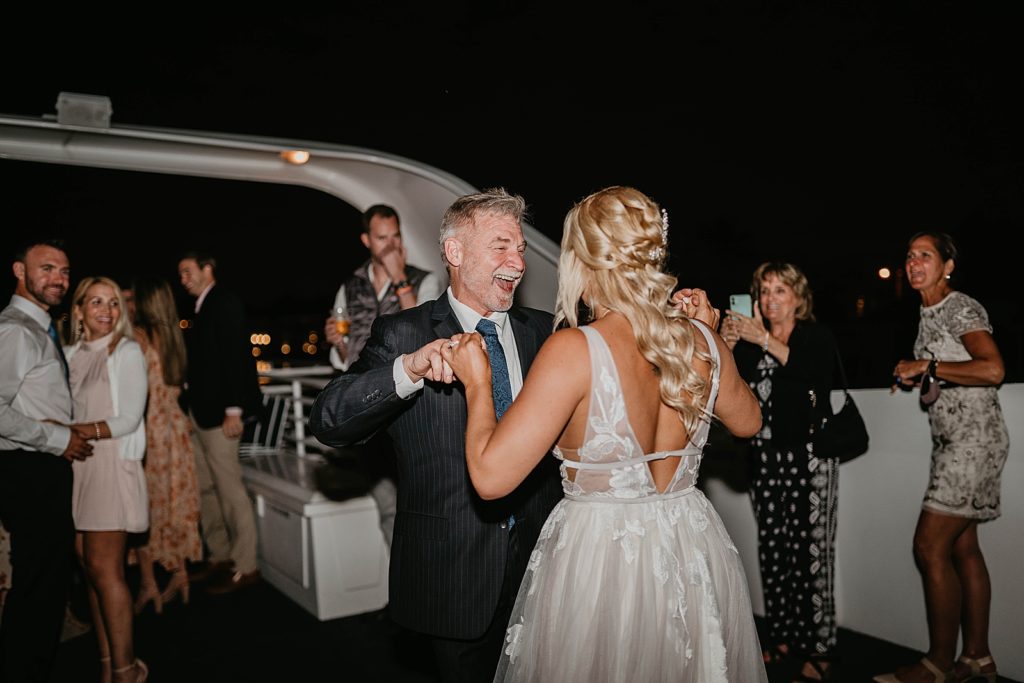 Bride dancing with older family member