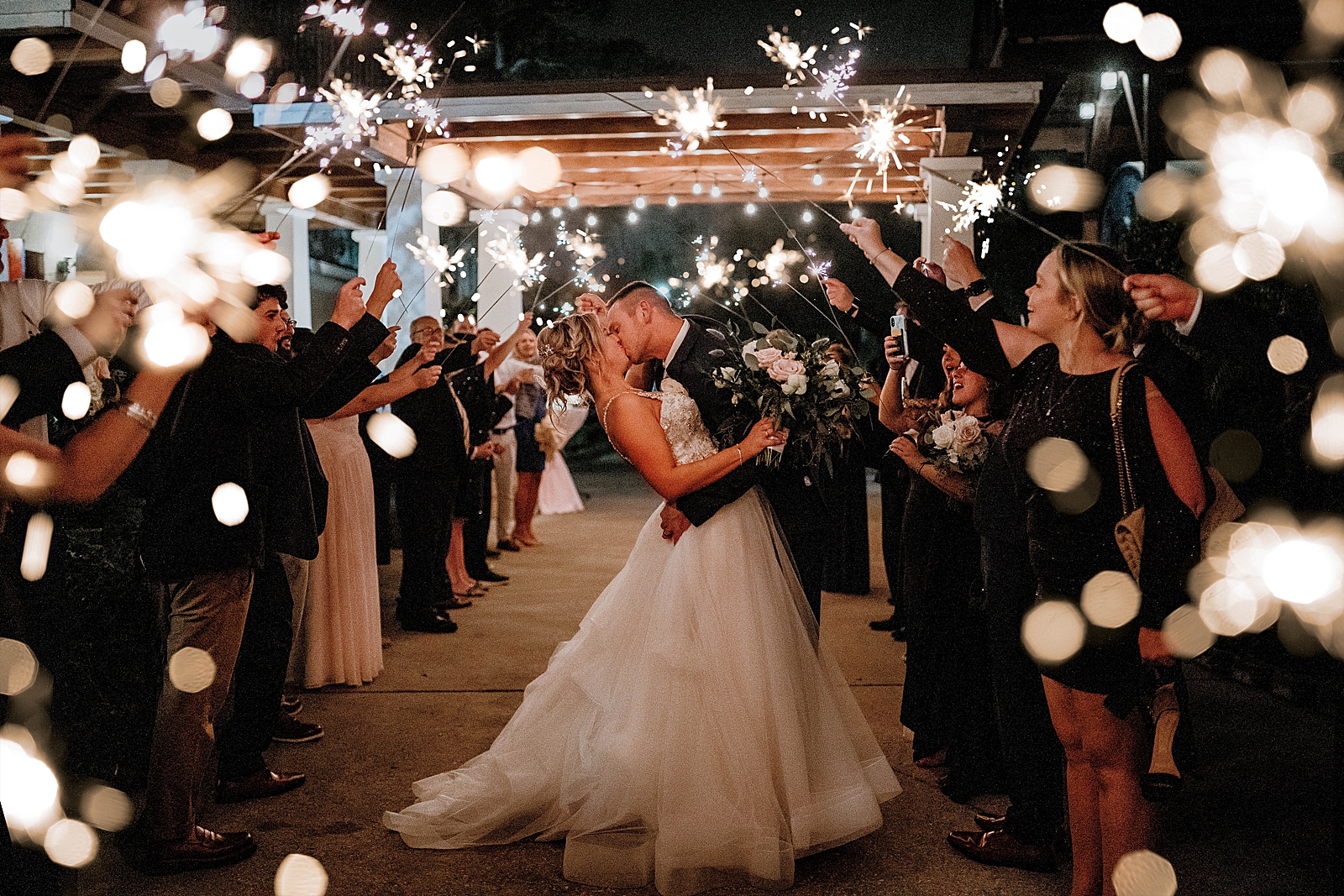 Bride and Groom dipping during sparkler exit
