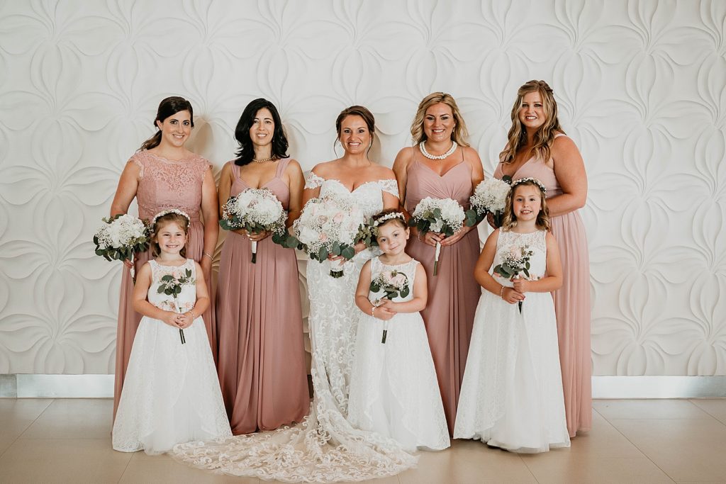 Bride with Bridesmaids and flower girls for formal portrait