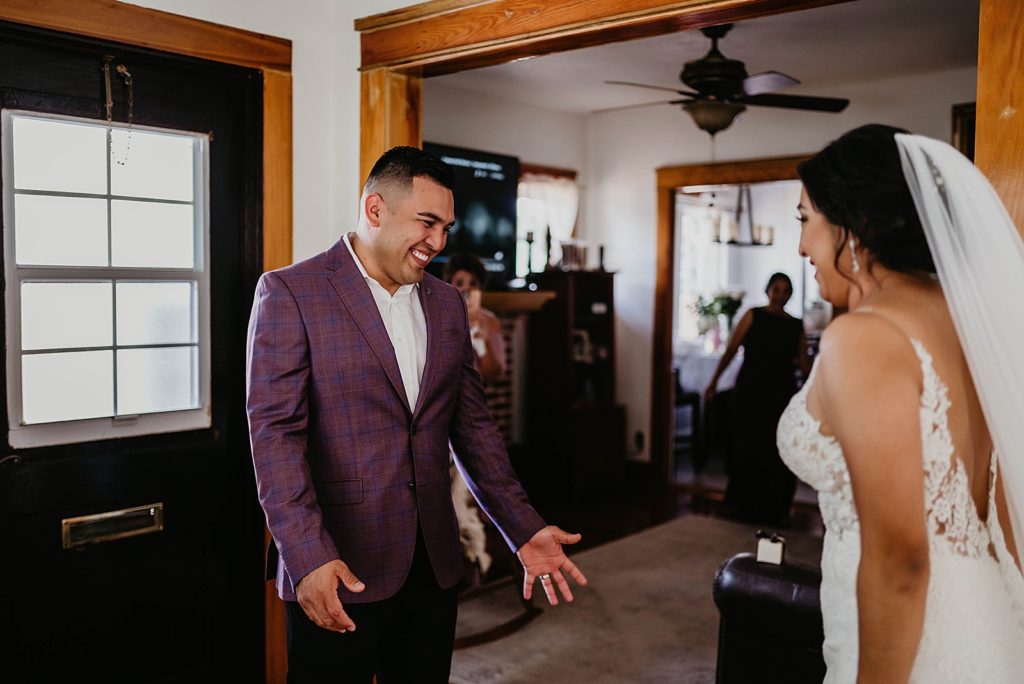 Groom's reaction to Bride in dress for First Look