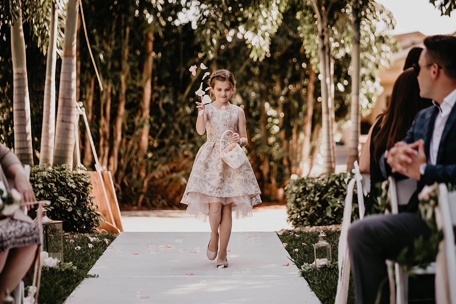 Flower Girl entering Ceremony with petals