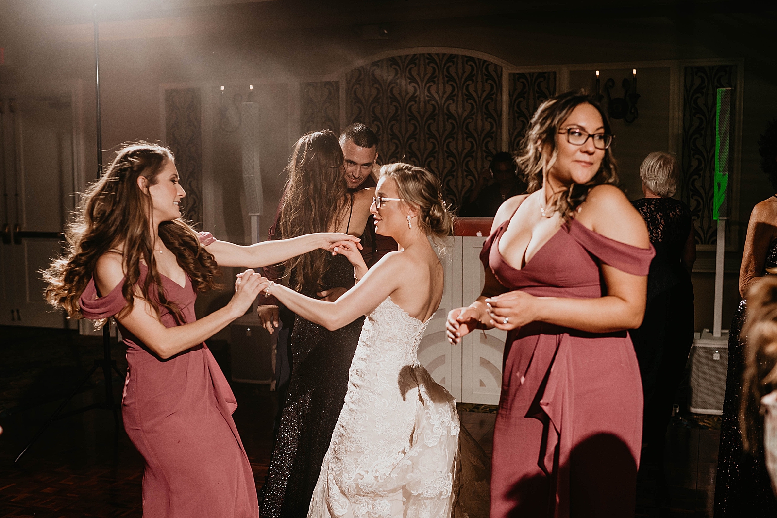 Bride dancing with Bridesmaids